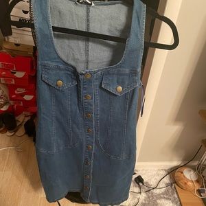 Never worn, women’s size large stretch denim mini dress. TTS
